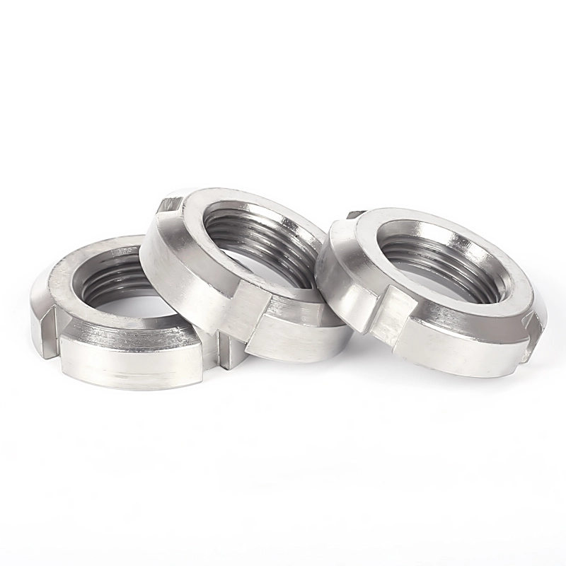 DIN 981 hornyos kerek anya